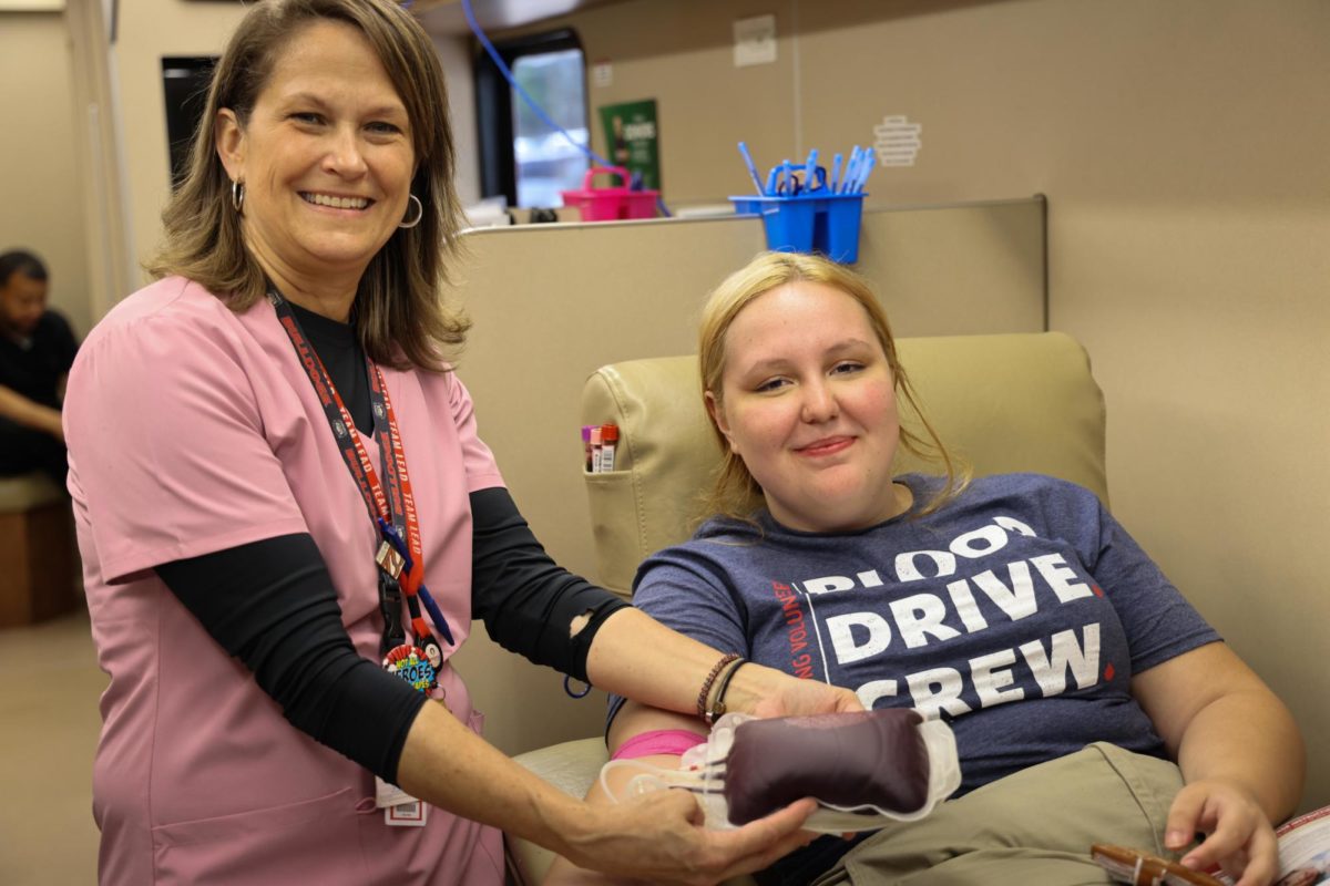 Samantha McGill, 11th grade, was one of the earliest to give blood for this drive. 