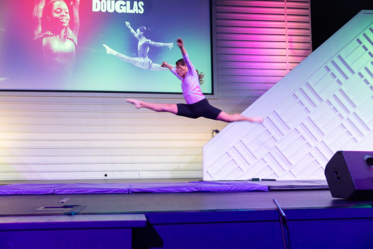 Evangeline Dudley, seventh grade, performed a floor routine from Simone Biles, an American Olympic gymnast who won four gold medals, one silver, and two bronze.