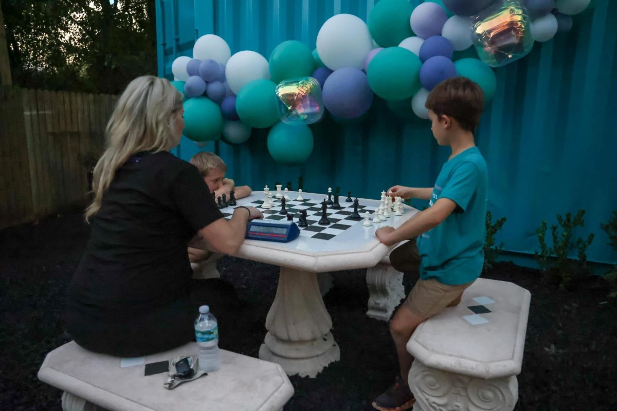 Chess club is a thriving club on campus. With this in mind, the uniform shop put a chess board out front for people to play while waiting on friends and family shopping in the shop. 