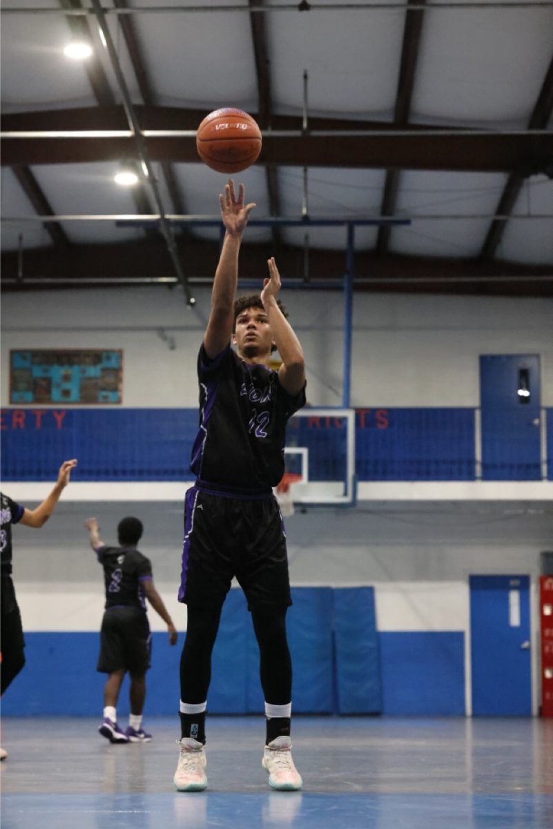 Jayden Febres Keppel shooting at the free throw line.