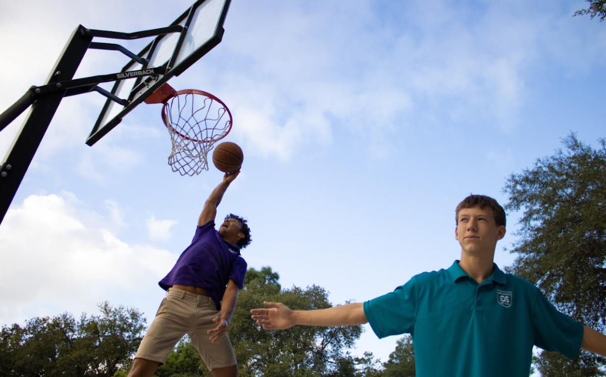 Scholars had the chance to take action shots of each other dunking in the Creative Photography class